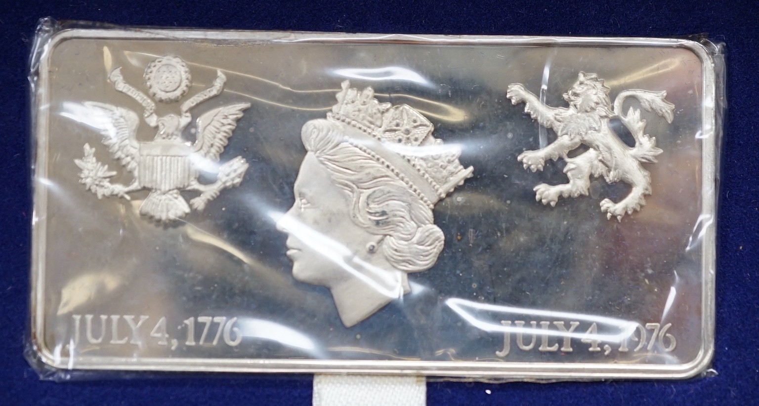 Pobjoy Mint eight silver crown 1977 set, two similar Isle of Man silver proof sets 1977, Franklin Mint British Virgin Islands Jubilee silver proof set, a Danbury silver ingot etc.